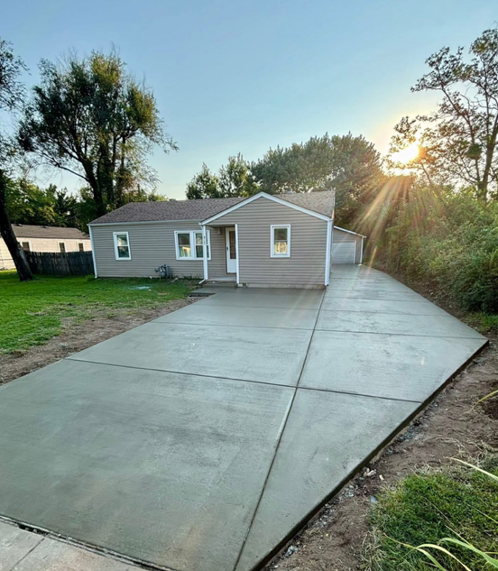 Transform your home's exterior with our expertly installed concrete driveways, ensuring durability, aesthetic appeal, and added value. experience a seamless blend of functionality and style tailored to your unique needs. for Twisted Ridge Construction LLC in Cheney, KS