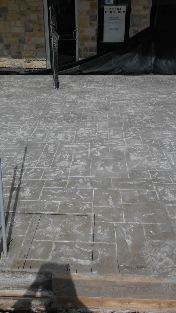 Enhance your home's appeal with our stamped concrete installation, offering durable and stylish surfaces that mimic the look of natural stone or brick, providing beauty and strength for driveways, patios, and walkways. for Texas Express Concrete in Dallas, TX