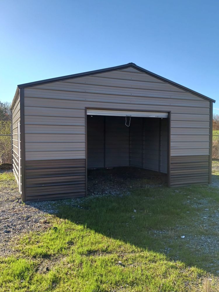 Our Carports service offers homeowners a stylish and practical solution for protecting their vehicles from the elements, enhancing curb appeal, and increasing property value. Customize your carport with us today! for Happy Homestead Structures in Fort Payne, AL