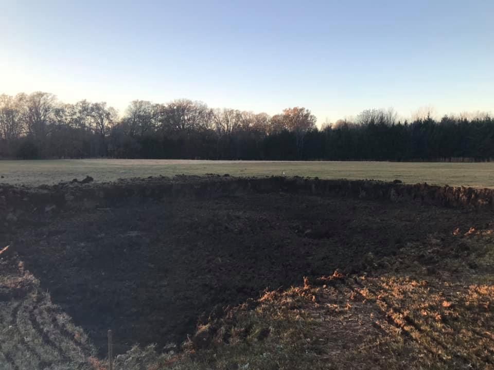 Our Leveling service ensures your land is precisely graded for construction, promoting stability and preventing drainage issues. Trust our experts to create a solid foundation for your next home project. for Bell Sand & Gravel in Bogata, TX