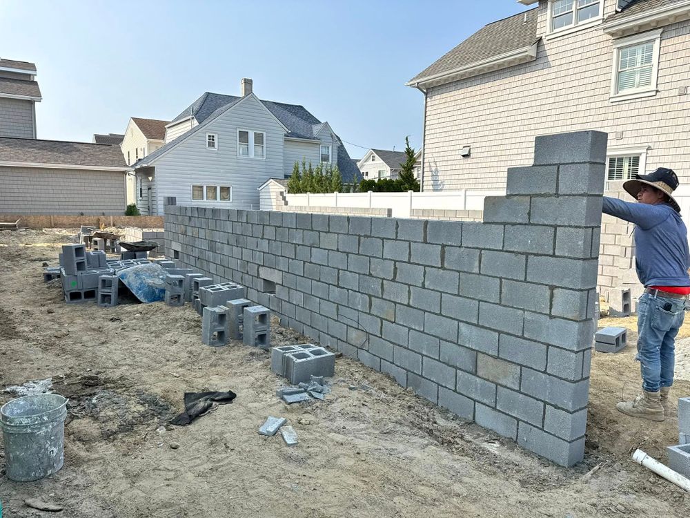 Our Retaining Wall Construction service expertly blends aesthetics and functionality to enhance your landscape. We ensure durable support against soil erosion while improving the visual appeal of your outdoor space. for Brayan ,The Boys Helps Masonry in Absecon, NJ