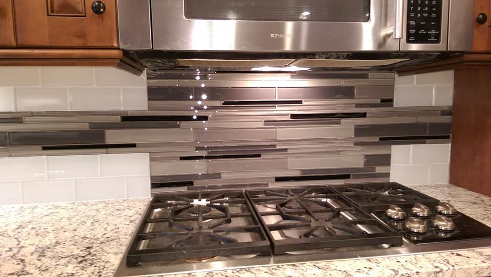 Transform your kitchen with our expert backsplash tiling services. We offer a variety of styles and materials, ensuring a perfect blend of beauty and functionality tailored to your unique preferences. for Rick's Tile and Marble in Taylorsville, UT