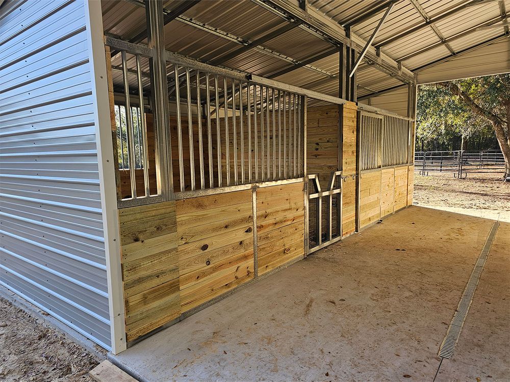 Our Custom Horse Barns service offers homeowners personalized design and construction solutions, ensuring durability, functionality, and aesthetics tailored to meet your equestrian needs. Transform your property with our expert craftsmanship. for Ken's Specialized Services in Fort White, FL