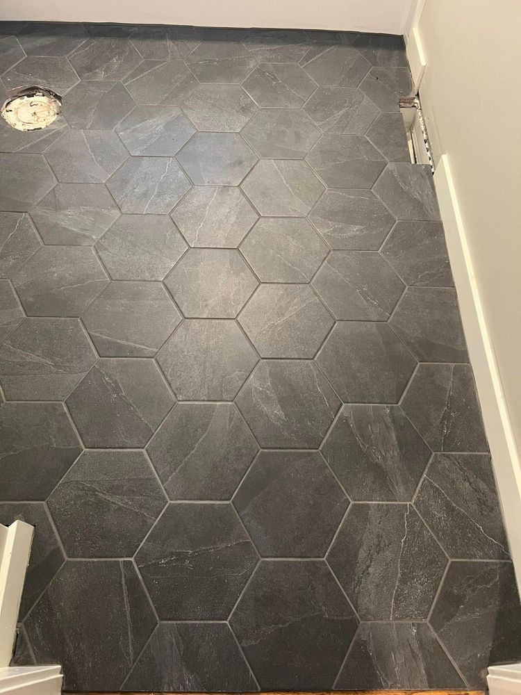 Our Waterproofing and Sealing service ensures durable, moisture-resistant surfaces by expertly applying protective layers, extending tile longevity and preventing water damage in your home’s bathrooms, kitchens, or outdoor areas. for Zenus Custom Tile in Kansas City, MO