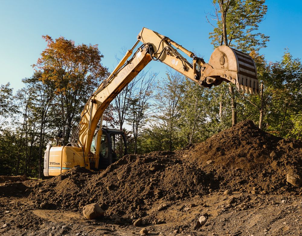 Carving a Pond into a Mountain Side for Andy Naylor Excavation in Johnson, VT