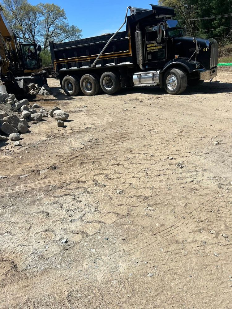 Our grading and leveling service prepares your property for construction, drainage, and landscaping by creating stable, even surfaces that prevent water issues, improve usability, and support long-lasting project success. for Redwood Construction in Cranston, RI