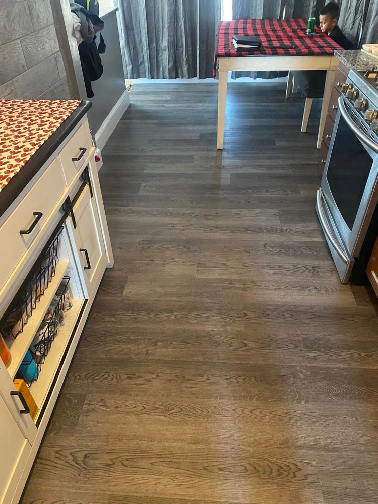 Our expert floor installation service ensures a seamless, professional finish for your home, using high-quality materials and precise techniques to deliver durable and aesthetically pleasing floors that enhance your living space. for A Carpet Guy Floors in Baltimore, MD