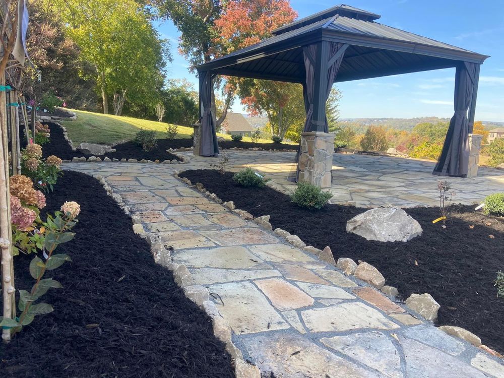 Transform your outdoor space with our Patio Design & Construction service. Our skilled team will work closely with you to create a functional and beautiful patio that enhances the beauty of your home. for Mtn. View Lawn & Landscapes in Chattanooga, TN