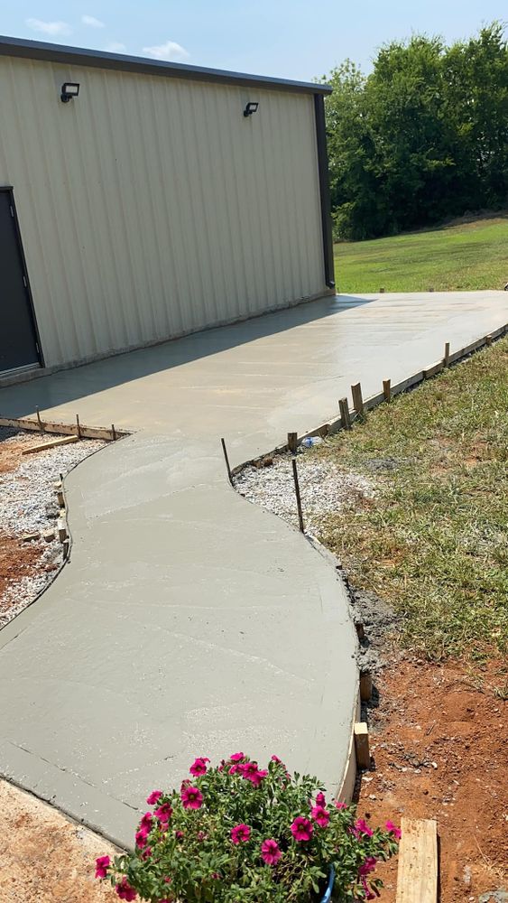 Our concrete services provide durable, high-quality solutions for your home's driveways, patios, and walkways. We ensure expert installation and precise finishes tailored to enhance your property’s aesthetic and functionality. for Henry's Construction in Nashville, TN