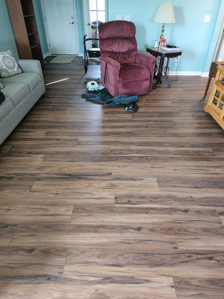 Our Flooring service offers a wide range of high-quality materials and expert installation to enhance the aesthetics and functionality of your home, transforming it into a stylish and comfortable space. for Empire Management Corporation in Madison Heights, MI