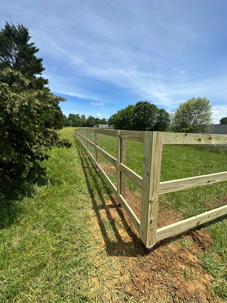 Our expert fence installation service provides homeowners with durable, aesthetically pleasing fences, ensuring security and privacy while enhancing property value. We offer customized solutions tailored to your landscape and personal preferences. for Kyle's Lawn Care in Kernersville, NC