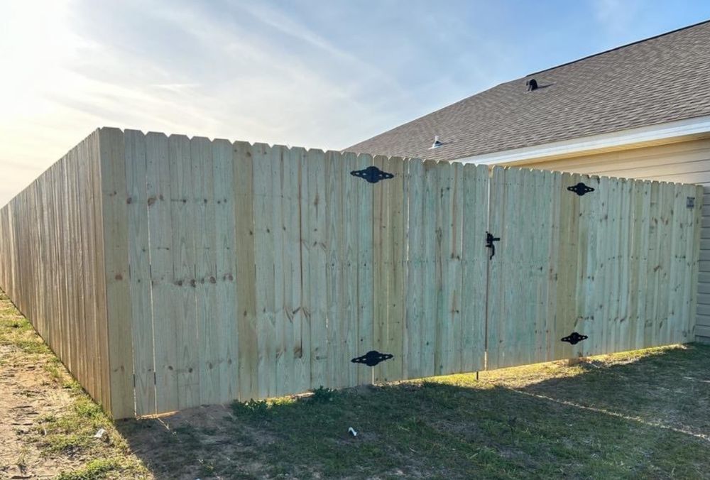 Our wooden fence installation service provides expert craftsmanship and durable materials, ensuring privacy and curb appeal for your home with a professional finish tailored to meet your unique fencing needs. for Smith & Sons Fence Company in Riverview, FL