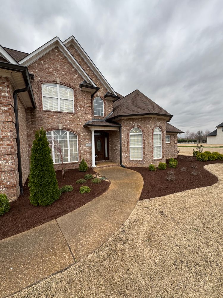 Enhance your home's curb appeal with our professional Mulch Installation service, providing high-quality materials and expert application to protect plants, reduce weeds, and maintain soil moisture for a healthier garden. for Kelso's Lawn Maintenance in Medina, TN