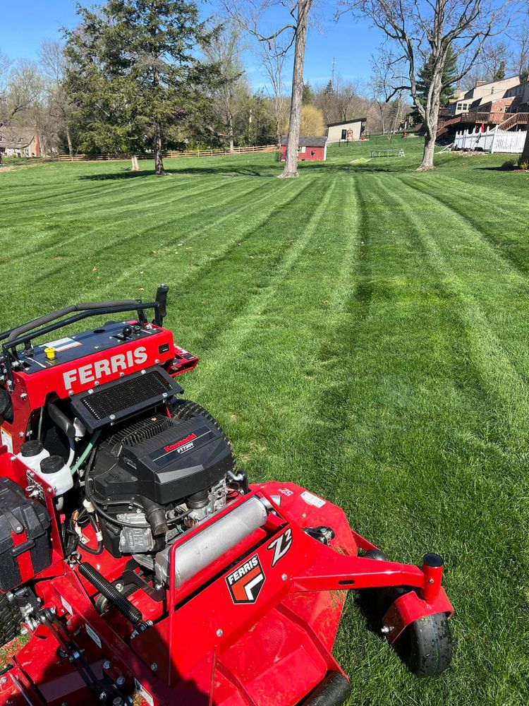 Our mowing service ensures your lawn is expertly trimmed and maintained, enhancing curb appeal and promoting healthy grass growth with professional care tailored to keep your outdoor space looking pristine year-round. for Green Hills Lawn Service in Washington, PA