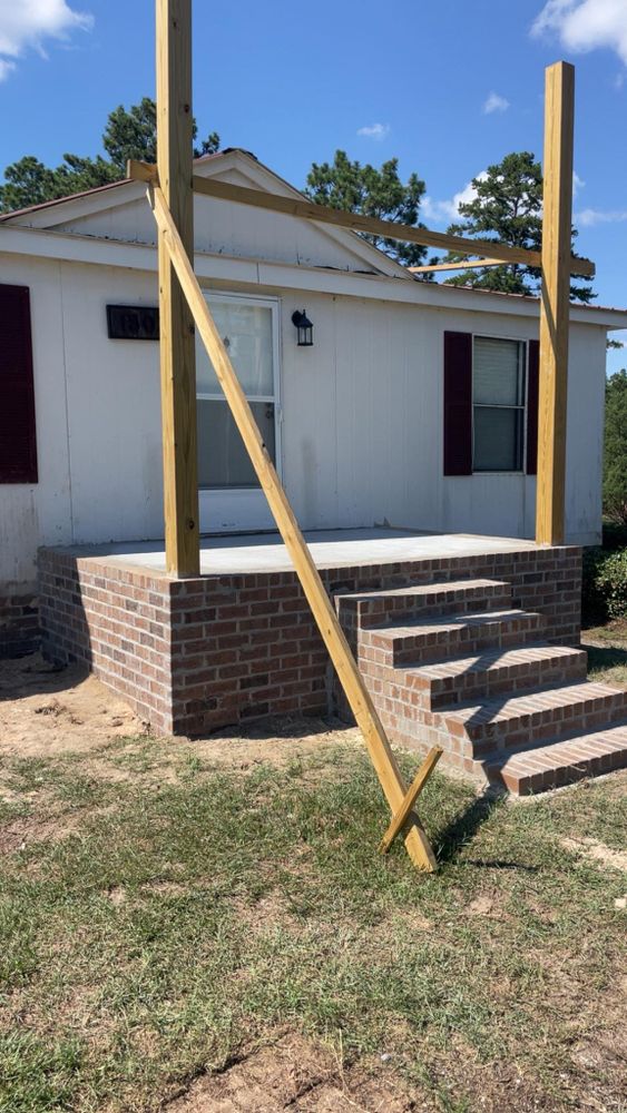Transform your home with our expert stair design and installation service, offering durable and stylish concrete solutions tailored to enhance the aesthetic appeal and functionality of your living space. for Palmetto Precision Concrete & More in Bethune, SC