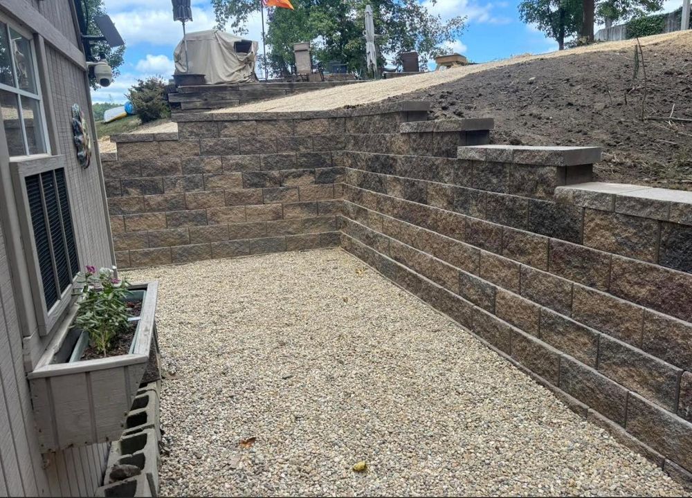 Our hardscape installation service creates durable patios, walkways, retaining walls, and outdoor features that enhance beauty, function, and value—professionally designed and built to complement your home and landscape perfectly. for Moon’s Lawn Service and Landscaping in Pana, IL
