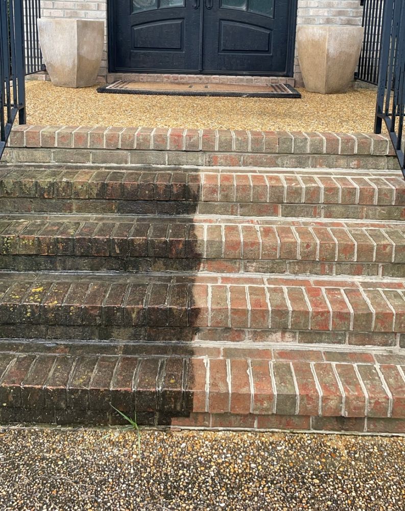 Enhance your home's curb appeal with our professional Pressure Washing service, effectively removing dirt, grime, and stains to restore surfaces like driveways and patios to their original pristine condition. for Quinten's Landscaping and Exterior Services LLC in Chesapeake, VA