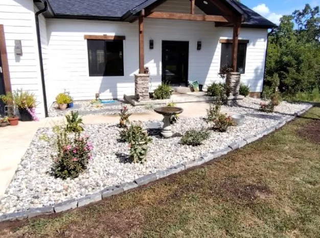 Enhance your outdoor space with our professional Landscape Design & Installation service, including meticulous mulch installation for optimal plant health and aesthetic appeal. Transform your garden into a beautiful, sustainable oasis today. for Superior Landscaping Design in Ava, MO