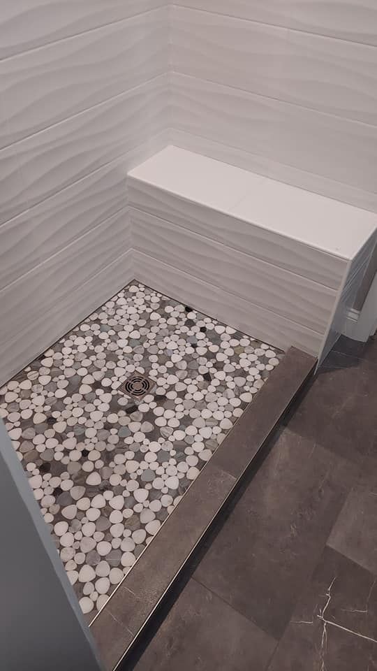 Transform your home with our expert tiling service, offering precision installation and a variety of stylish tile options to enhance any space, ensuring durability and a stunning finish every time. for Arbor Strong Construction in Ann Arbor, MI