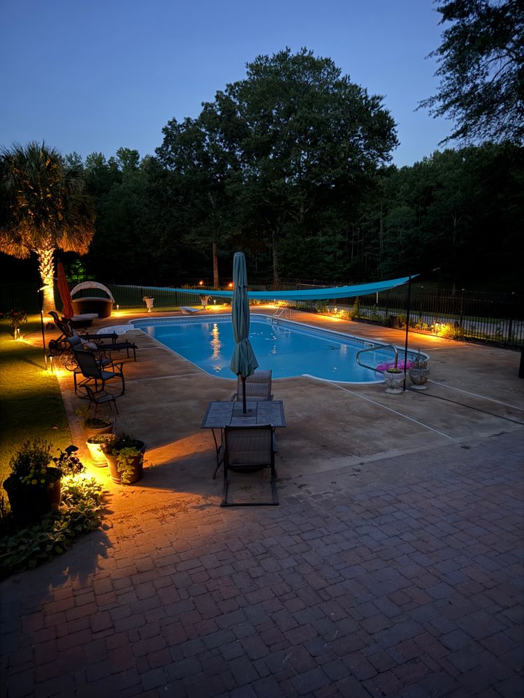 Enhance your home's curb appeal and safety with our expert commercial landscaping lighting services, providing customized illumination solutions that highlight your property's best features while increasing security and nighttime visibility. for J&J Hauling and Outdoor LLC  in Fayetteville, GA