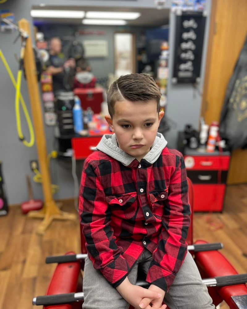 Our Kids Haircuts service offers a fun, stress-free environment with skilled stylists who ensure your child receives a stylish and comfortable haircut experience tailored specifically for young clients. for LGND CUTS in Williston, ND