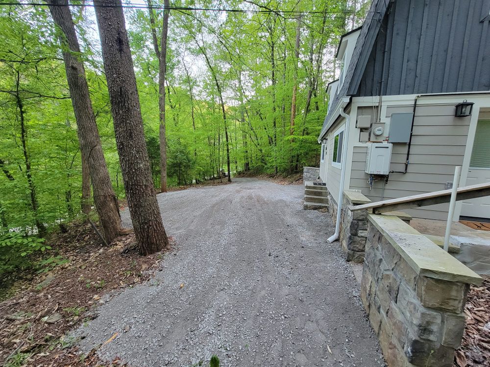 Our Roadbeds service ensures a solid foundation for driveways or pathways, using expert excavation techniques to provide long-lasting durability and stability tailored specifically for residential properties. for Carter’s Grading Services in Greenback, TN