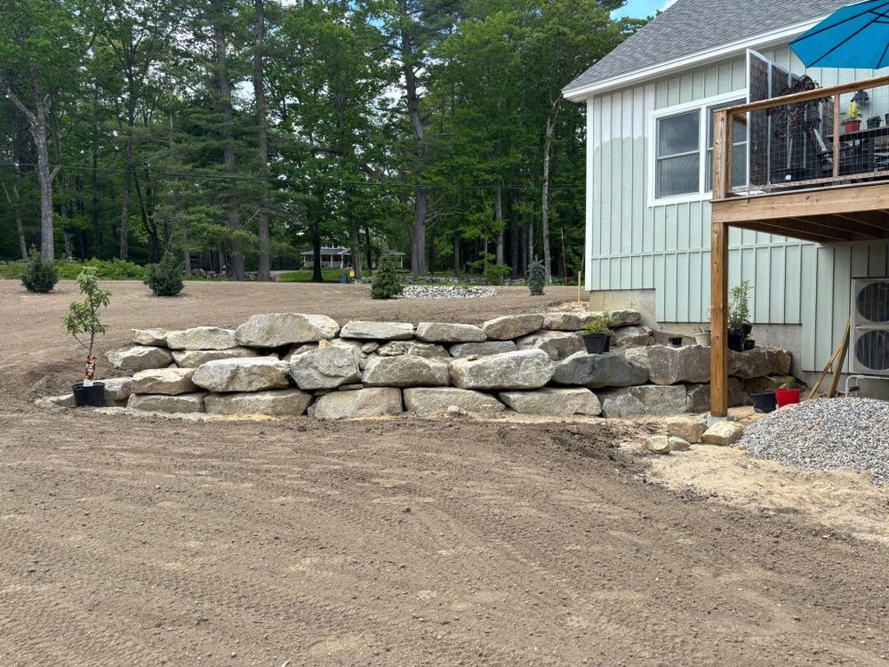 Our Rock Walls service combines expert craftsmanship and durable materials to enhance your property’s landscape, providing both aesthetic beauty and practical functionality for retaining soil and creating stunning outdoor features. for A&D Excavation & Landscaping in Conway, NH
