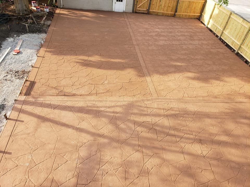 Enhance your outdoor space with our professional stamped concrete installation, offering durability and aesthetic appeal. Choose from diverse patterns and colors to beautifully mimic stone, brick, or wood, enhancing your home's value. for Kadosh Construction in Chicago, IL