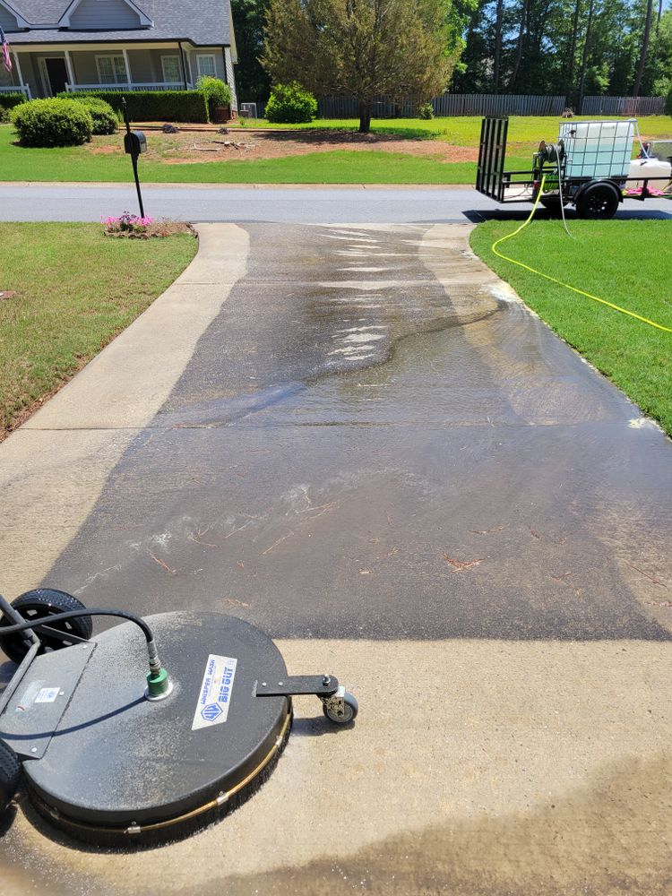 Our driveway and sidewalk cleaning service restores the curb appeal of your home by removing dirt, grime, mold, and other unsightly stains using high-pressure washing techniques for a fresh and clean appearance. for Hydro Hustle in Athens,  GA