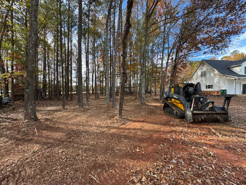 Our Forestry Mulching service efficiently clears overgrown land, turning unwanted vegetation into beneficial mulch. Ideal for site preparation and enhancing property aesthetics, this eco-friendly solution preserves topsoil and supports healthy regrowth. for KLNAX Enterprises Inc. in Social Circle, GA