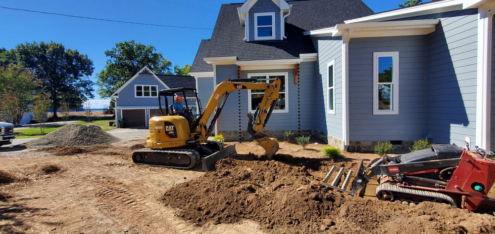 Discover the excavation meaning with our expert service: we safely and efficiently prepare your property for landscaping projects by removing soil and debris to create a solid foundation for your vision. for RA Lawn Care, Landscape & Hardscape in Littleton, NC