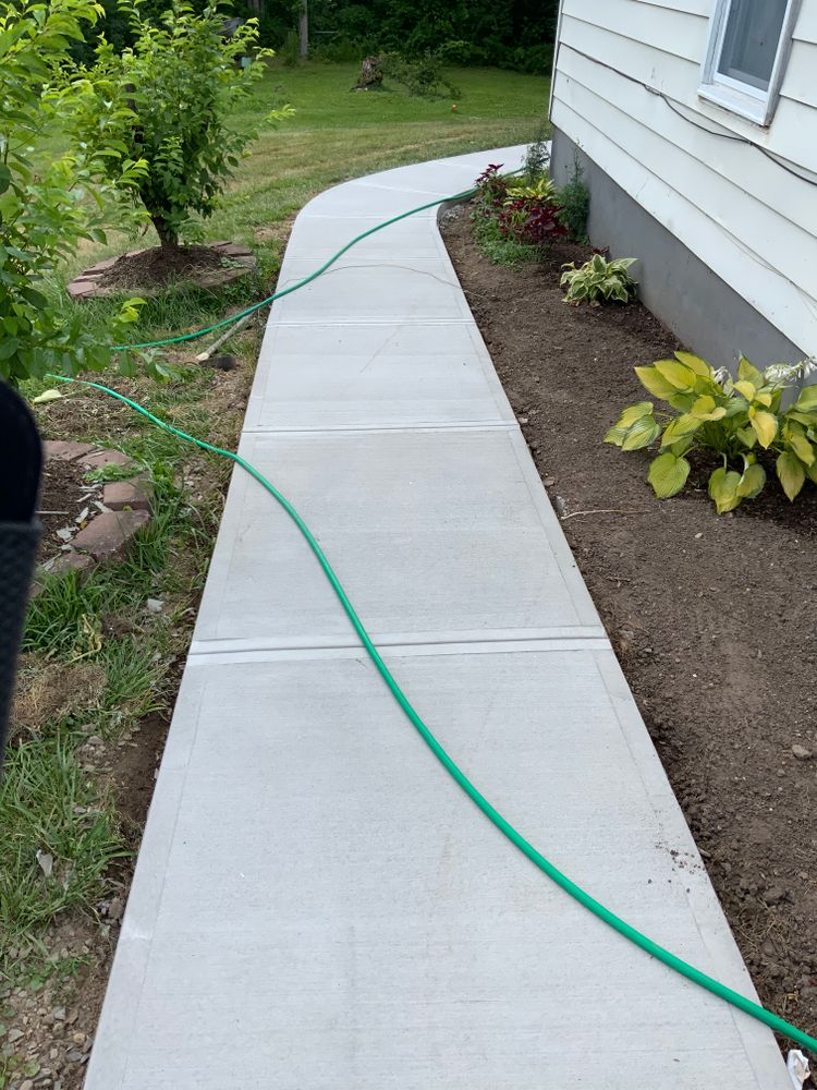 Our Concrete Services offer top-quality installation and repair of concrete walkways, patios, driveways, and retaining walls to enhance the functionality and elegance of your outdoor living space. for Elyon Construction and Stoneworks LLC in Windsor, CT