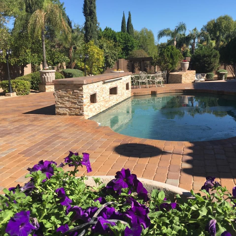 Our professional shrub trimming service helps maintain the health and appearance of your landscape by pruning overgrown shrubs, shaping them into attractive forms, and promoting new growth for a vibrant garden. for Desert Oasis Hardscape LLC  in Scottsdale, Arizona