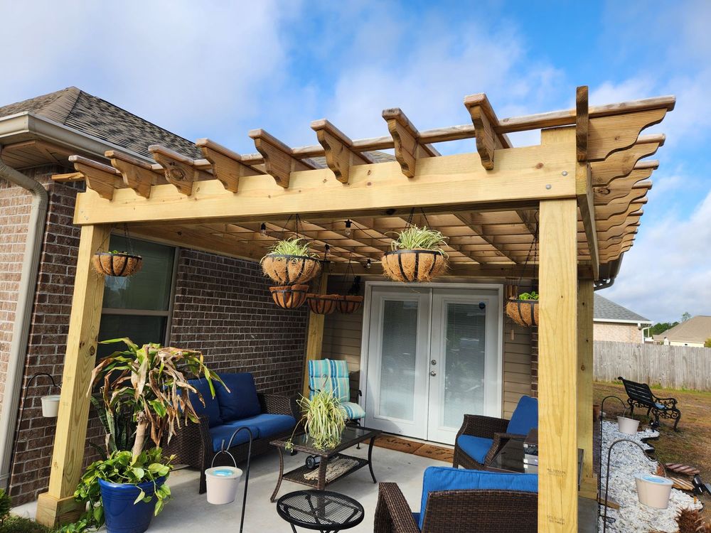 Enhance your outdoor space with our custom pergolas, offering stylish shade and comfort. Our designs seamlessly integrate with your landscape, providing a perfect blend of functionality and elegance for any backyard. for Phillips Fencing Solutions in Pensacola, FL