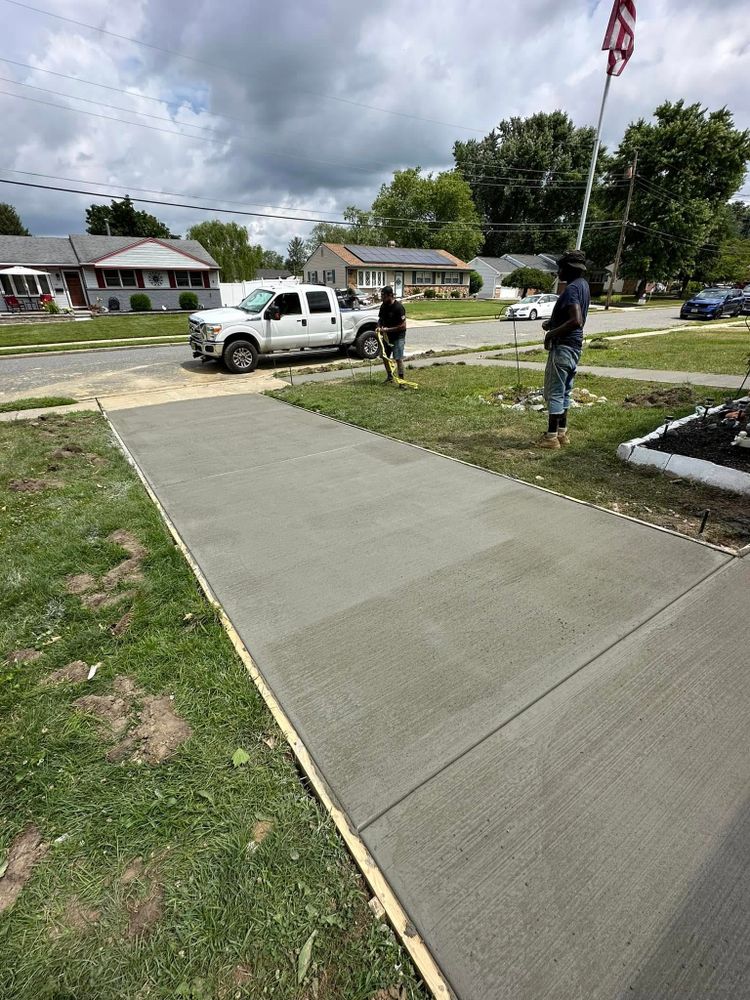 Our Roadbeds service expertly prepares a stable foundation for driveways and pathways, ensuring longevity and durability by using quality materials and precise grading techniques tailored to your property's unique needs. for Samuel Zeilman Construction in Woodbury Heights, NJ