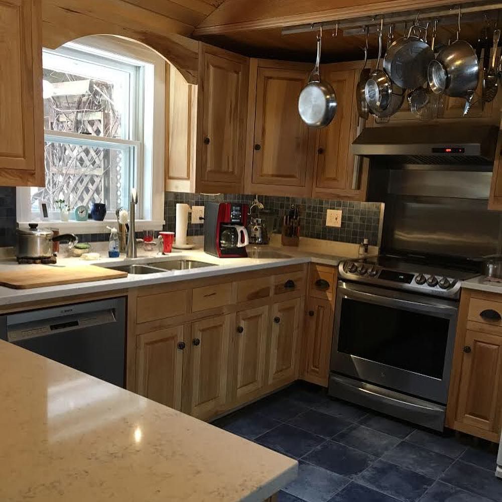 Revitalize your kitchen and cabinets with our refinishing service, bringing new life to your space through expert painting techniques that enhance durability, aesthetic appeal, and overall home value. for Lorenc Dahri LLC in South Burlington, VT