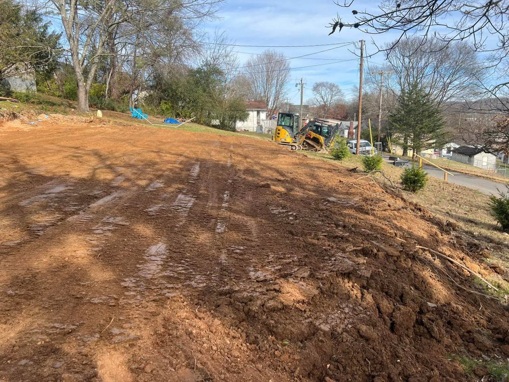 Our Land Grading service ensures your property's foundation is level, preventing water pooling and structural issues. Trust us to create a smooth and stable surface for your outdoor projects. for KTN Excavation in Clinton, TN