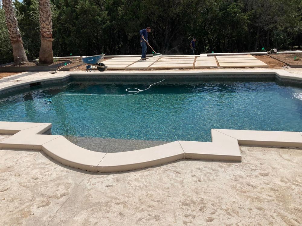 Elevate your outdoor living space with our expert Patio Design & Installation service. Our team will transform your backyard into a stylish and functional area for relaxing and entertaining guests. for Merino Concrete Construction LLC in Liberty Hill, TX