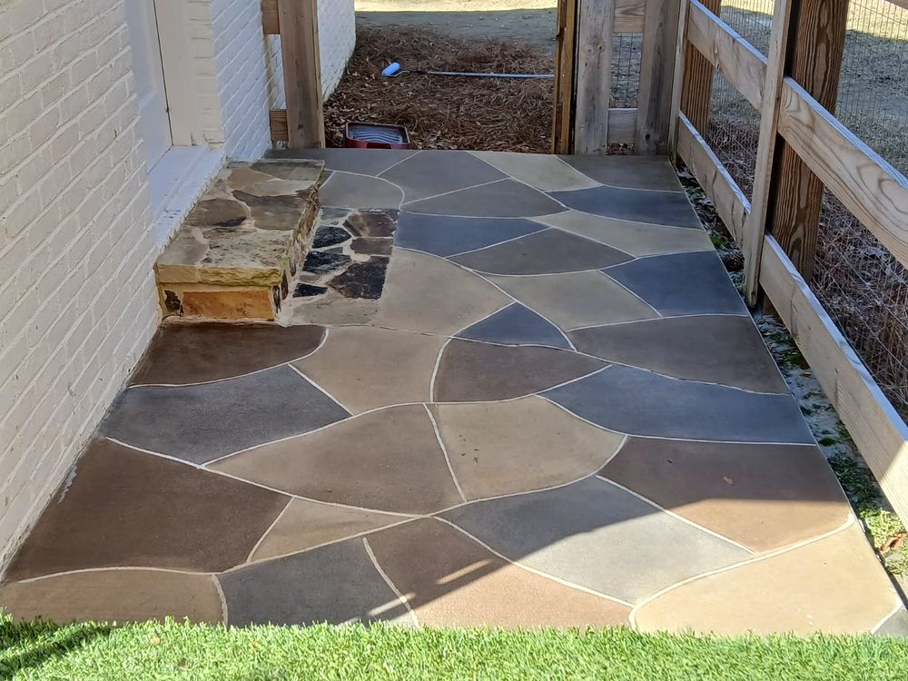 Enhance your home's curb appeal with our expert driveway construction service, offering durable and stylish concrete solutions tailored to fit your unique design preferences and built to withstand the test of time. for Pitbull Decorative Concrete in Albany, Georgia
