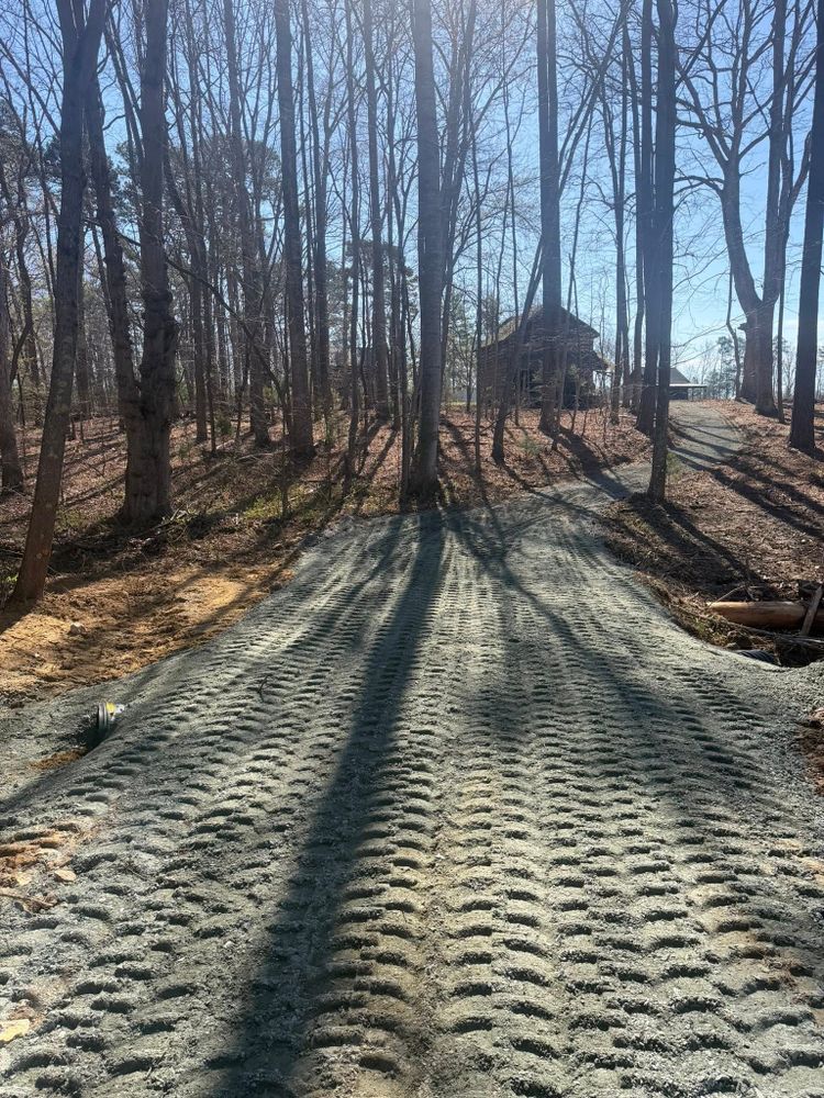 Our driveway construction service prepares, grades, and builds durable surfaces for lasting performance. From proper drainage to smooth access, we handle every step of your driveway installation professionally. for Hunt’s Hauling & Landworks LLC in Danville, VA