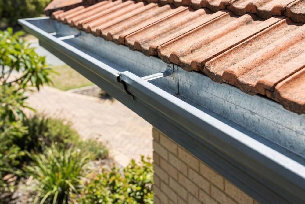 Our Roof and Gutter Cleaning service safely removes debris, moss, algae, and buildup to protect your home, improve drainage, prevent damage, and restore a clean, well-maintained exterior appearance. for High Quality H2O Pressure Washing in Fort Valley, GA