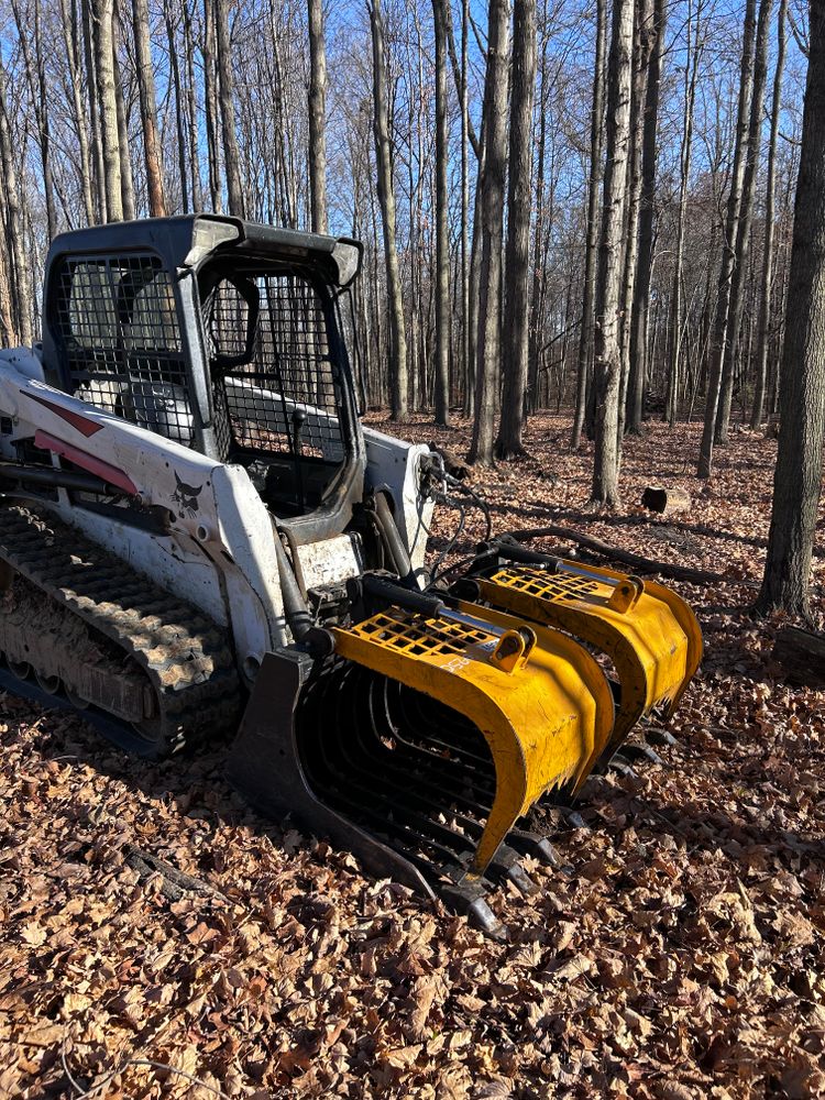Our Land Clearing service ensures a clear, debris-free site ready for construction. We handle tree removal and grading with precision, setting the stage for your new concrete project seamlessly and efficiently. for Solid Rock Concrete & Landwork in Galion, OH