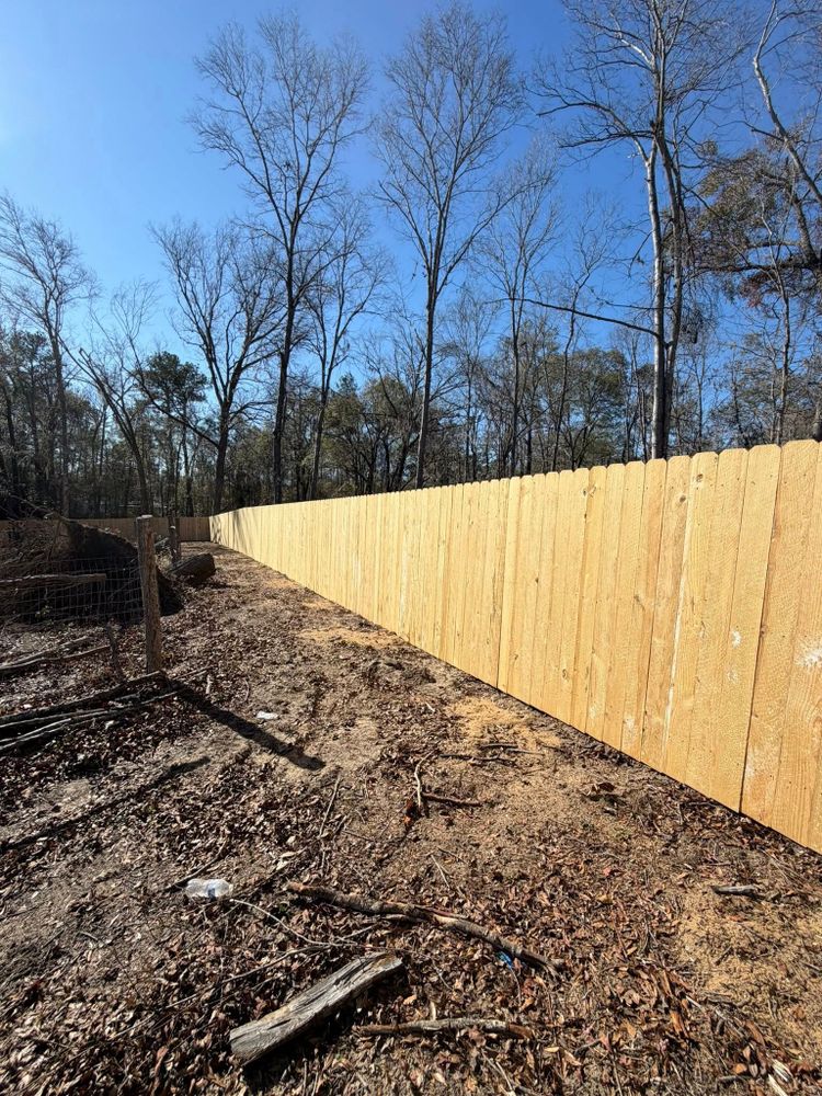 Enhance your outdoor space with our professional fencing services, offering durable materials and expert installation to ensure privacy, security, and style that complements your home's landscape beautifully. for Starkey Outdoor Improvements and Design in Evans, GA
