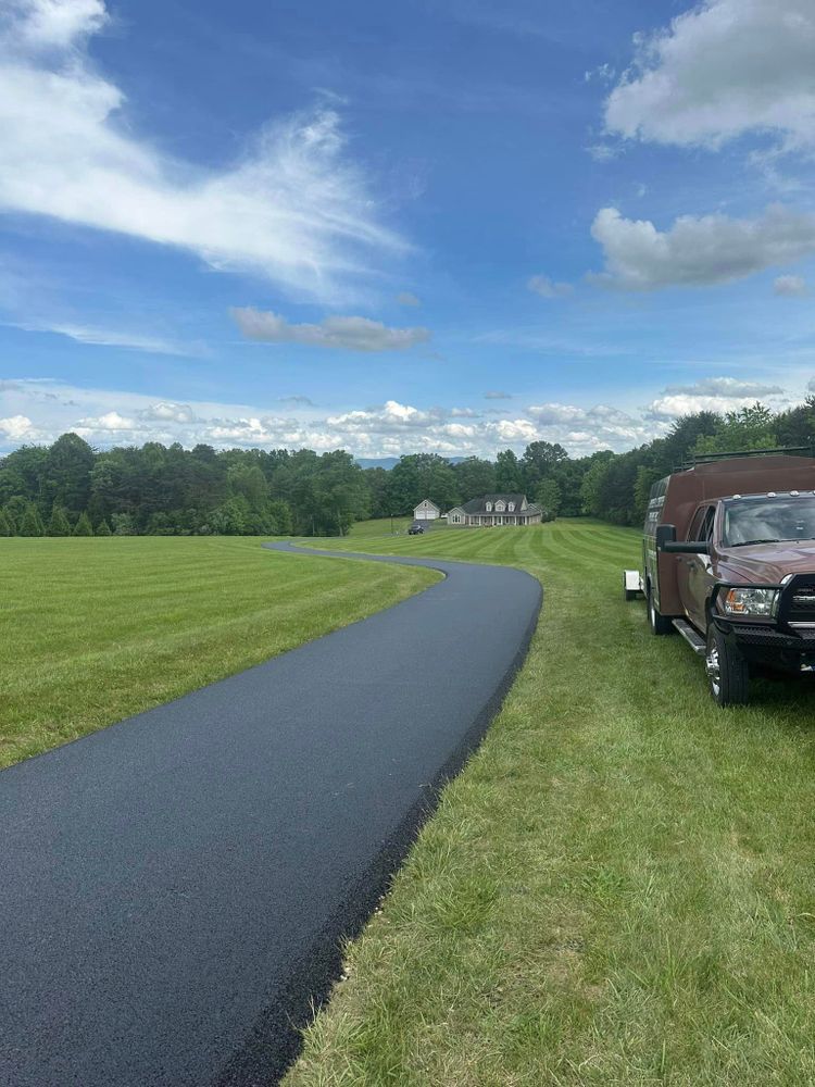 Our paving service specializes in expert asphalt installation for driveways, parking lots, and roads, ensuring durability and enhancing the functionality of your business. for James R Carter Paving in Roanoke, VA