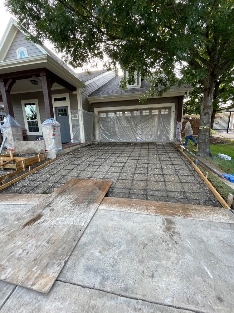 Our driveway design and build service offers homeowners the opportunity to customize their own concrete driveways, ensuring durability and aesthetic appeal while enhancing the overall value of their property. for New Gen Concrete in Keller, TX