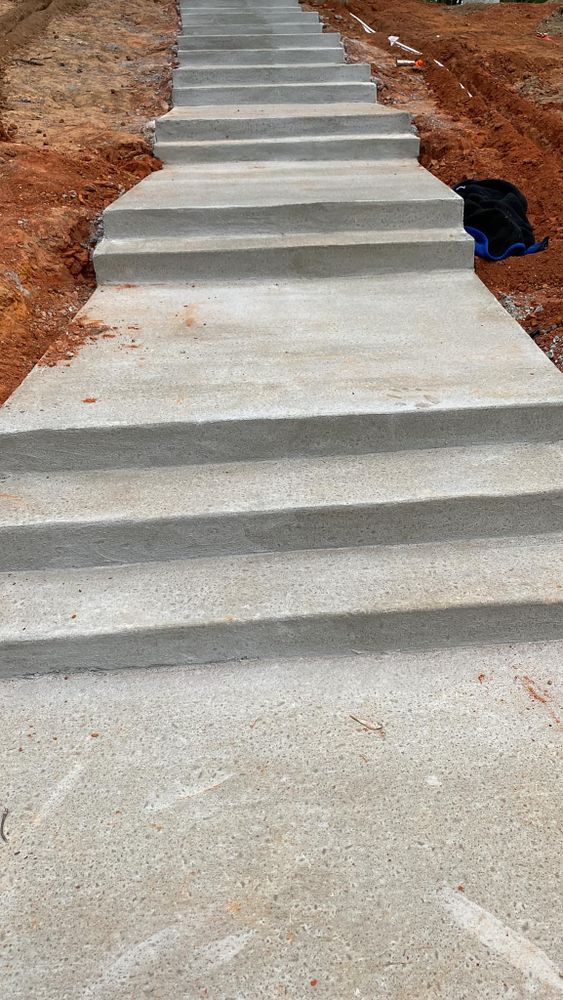 Our Stair Design & Installation service offers homeowners the opportunity to enhance their property with durable and stylish concrete stairs, expertly crafted to elevate aesthetic appeal and improve functionality in any space. for JMD Concrete Company in Gilmer,  TX