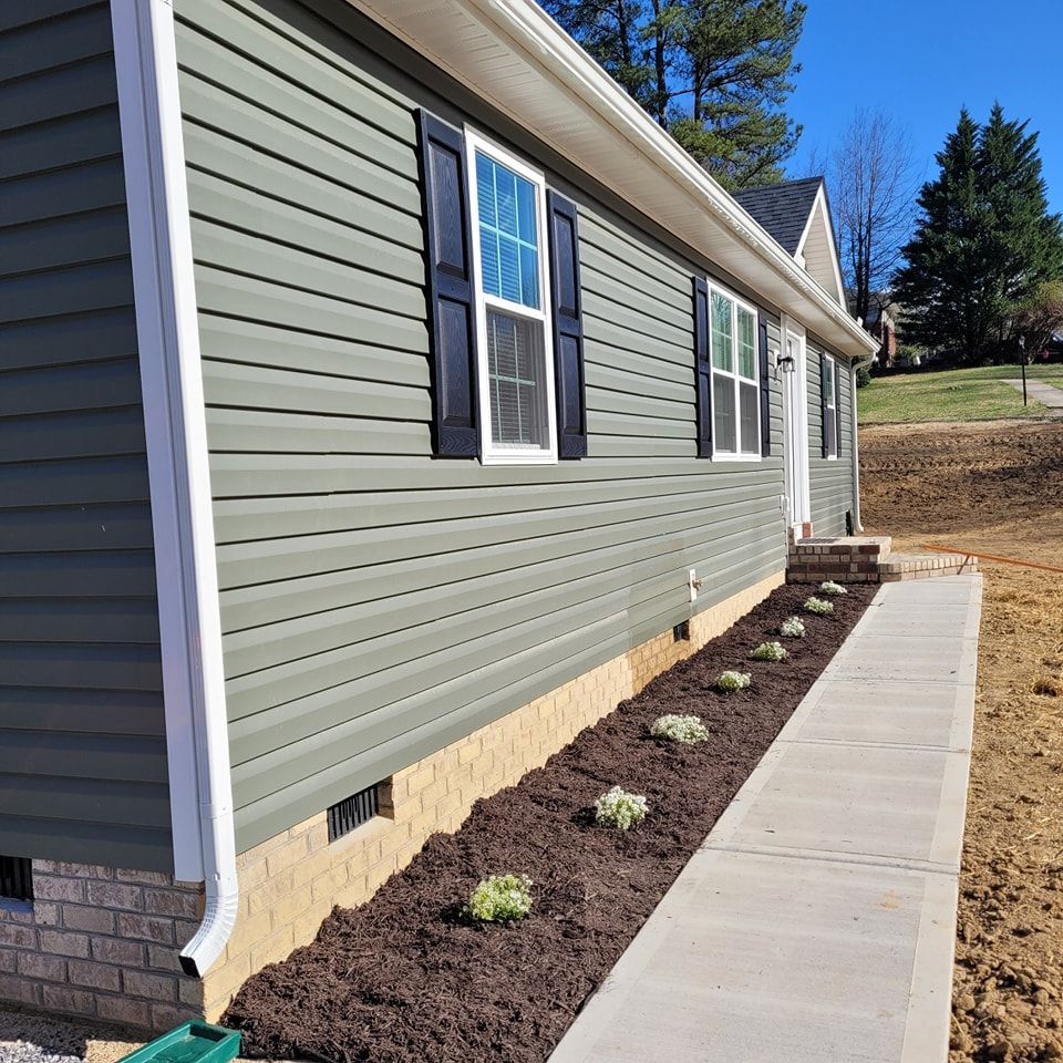 Enhance your home's curb appeal and energy efficiency with our expert vinyl siding house services, providing durable, low-maintenance solutions designed to withstand harsh weather while maintaining a beautiful exterior for years. for Cornerstone Construction in Lynchburg, VA