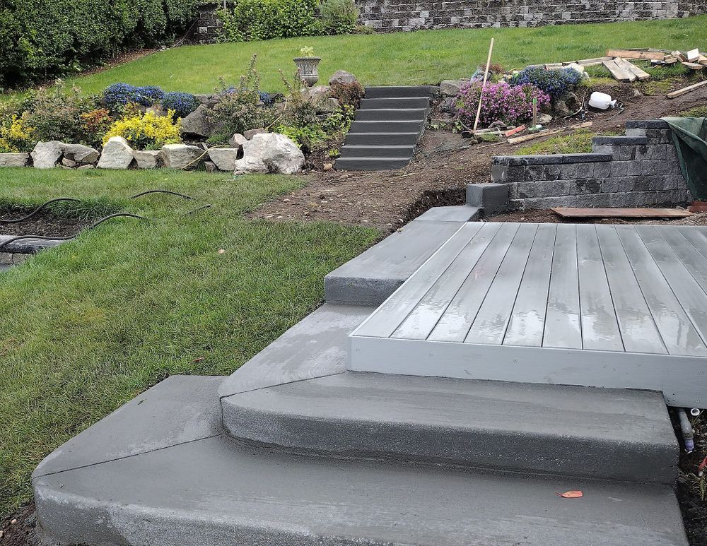 Our Stair Design & Installation service offers homeowners the opportunity to enhance their property with durable and stylish concrete stairs, expertly crafted to elevate the aesthetics and functionality of their home. for MC concrete in Shelton, WA