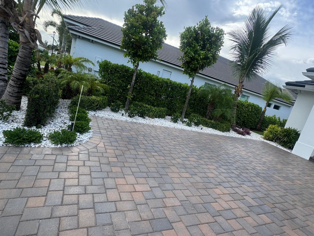 Transform your outdoor space with our expertly crafted paver patio designs, offering durability and aesthetic appeal. Enhance your home's beauty while creating a functional area perfect for relaxation and entertainment. for Prestige Landscape Solutions in Vero Beach, FL