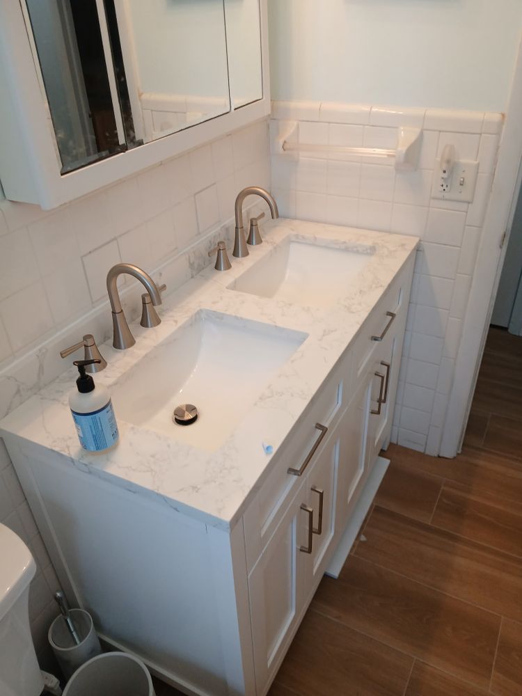 Revitalize your space with our expert bathroom renovation service, blending functionality and style. We offer tailored designs, quality craftsmanship, and efficient project management to transform your vision into reality. for Mick's Home Improvements LLC in Palm Bay, FL